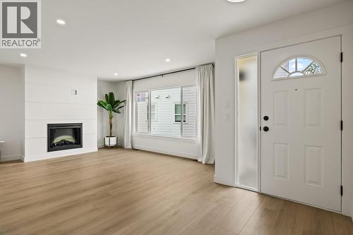 882 Hubbard Road, Kelowna, BC - Indoor Photo Showing Other Room With Fireplace