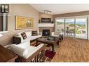 5175 Sandhills Drive, Kelowna, BC  - Indoor Photo Showing Living Room With Fireplace 