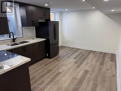 2111 Wilson Street, Innisfil, ON - Indoor Photo Showing Kitchen With Double Sink