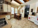 32 11Th Avenue Se, Swift Current, SK  - Indoor Photo Showing Kitchen With Double Sink 