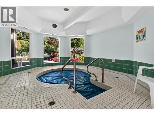 615 Glenmeadows Road Unit# 69, Kelowna, BC - Indoor Photo Showing Other Room With In Ground Pool