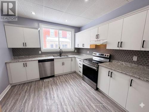 Colour enhanced - 25 Kensington Avenue, Smiths Falls, ON - Indoor Photo Showing Kitchen With Double Sink