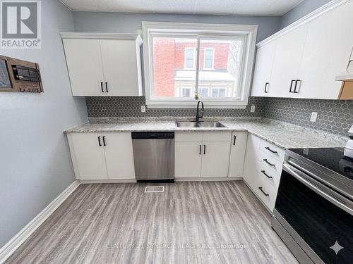 Colour enhanced - 25 Kensington Avenue, Smiths Falls, ON - Indoor Photo Showing Kitchen With Double Sink