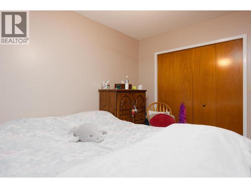 Side A - 255 Holbrook Road W, Kelowna, BC - Indoor Photo Showing Bedroom