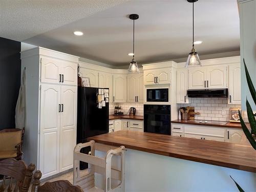 408 Dixie Road, Swan River, MB - Indoor Photo Showing Kitchen
