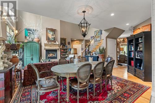 1 Karsam Court, Niagara-On-The-Lake (Town), ON - Indoor Photo Showing Dining Room With Fireplace
