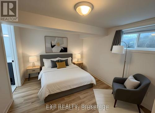 Primary Bedroom Virtually Staged - Lower - 105 Mill Street, Shelburne, ON - Indoor Photo Showing Bedroom