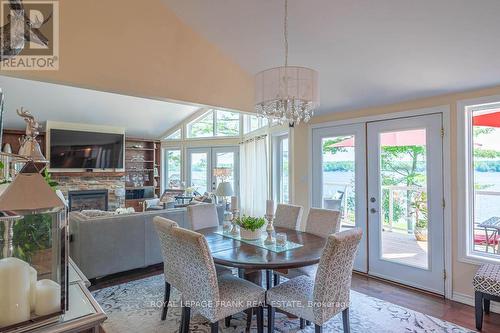 113 Fire Route 37, Trent Lakes, ON - Indoor Photo Showing Dining Room With Fireplace