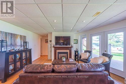 113 Fire Route 37, Trent Lakes, ON - Indoor Photo Showing Living Room With Fireplace