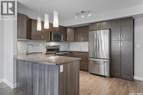 315 2321 Windsor Park Road, Regina, SK - Indoor Photo Showing Kitchen With Stainless Steel Kitchen With Upgraded Kitchen