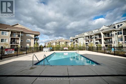 205 - 2 Cove Court, Collingwood, ON - Outdoor With In Ground Pool