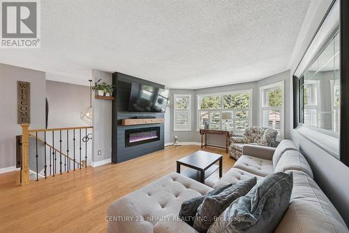 1049 Glenhare Street, Cobourg, ON - Indoor Photo Showing Living Room With Fireplace