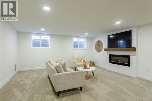 3591 Mia Lane, Plympton-Wyoming, ON - Indoor Photo Showing Basement With Fireplace
