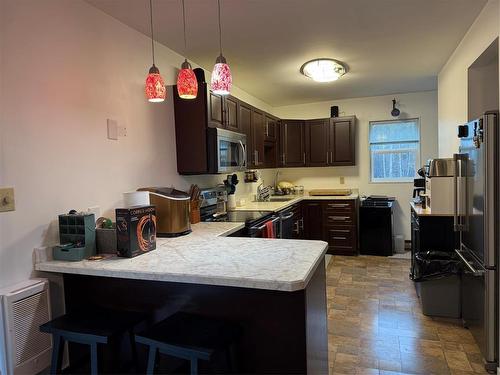 405 Gadwell Place, Duck Mountain Provincial Park, MB - Indoor Photo Showing Kitchen