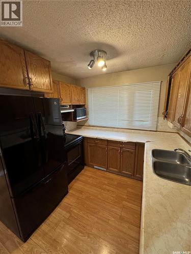 522 1St Street E, Lafleche, SK - Indoor Photo Showing Kitchen With Double Sink