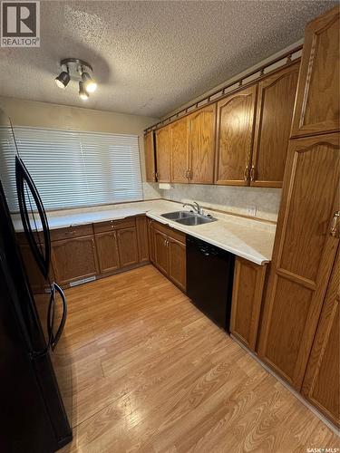 522 1St Street E, Lafleche, SK - Indoor Photo Showing Kitchen With Double Sink