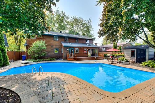 Pool - 107 Av. De Charente, Saint-Lambert, QC - Outdoor With In Ground Pool With Deck Patio Veranda With Backyard
