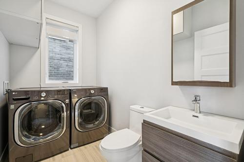 Salle de lavage - 5960 Rue Alexandre, Brossard, QC - Indoor Photo Showing Laundry Room