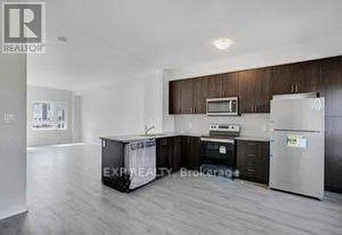 91 - 51 Sparrow Avenue E, Cambridge, ON - Indoor Photo Showing Kitchen