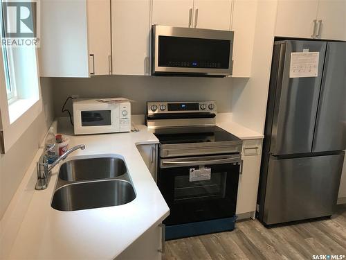 1143 Montague Street, Regina, SK - Indoor Photo Showing Kitchen With Stainless Steel Kitchen With Double Sink