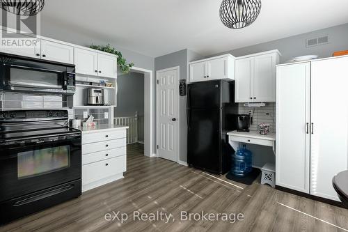 363912 18 Side Road, Meaford, ON - Indoor Photo Showing Kitchen With Fireplace