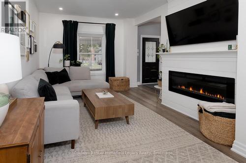95 Mcnab Street, Stratford, ON - Indoor Photo Showing Living Room With Fireplace