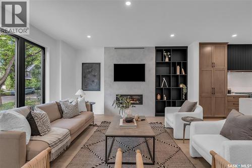 1121 13Th Street E, Saskatoon, SK - Indoor Photo Showing Living Room With Fireplace