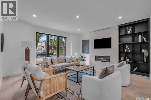 1121 13Th Street E, Saskatoon, SK - Indoor Photo Showing Living Room With Fireplace