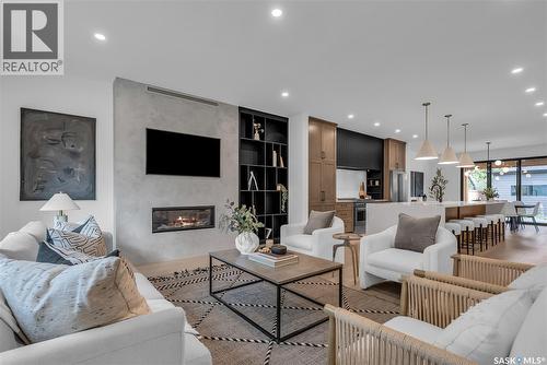 1121 13Th Street E, Saskatoon, SK - Indoor Photo Showing Living Room With Fireplace