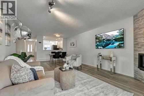 1765 Leckie Road Unit# 115, Kelowna, BC - Indoor Photo Showing Living Room With Fireplace