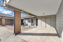 Two parking stalls - one in carport and then additional spot #13 - 