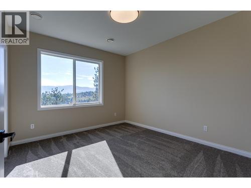 Bedroom down - 1084 Aurora Heights, West Kelowna, BC - Indoor Photo Showing Other Room