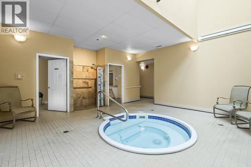 1967 Underhill Street Unit# 704, Kelowna, BC - Indoor Photo Showing Other Room With In Ground Pool