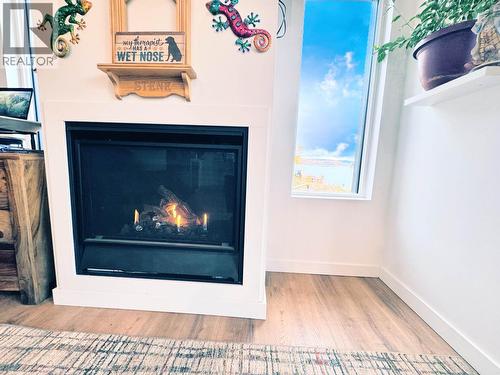6656 North Shore Horse Lake Road, Horse Lake, BC - Indoor Photo Showing Other Room With Fireplace