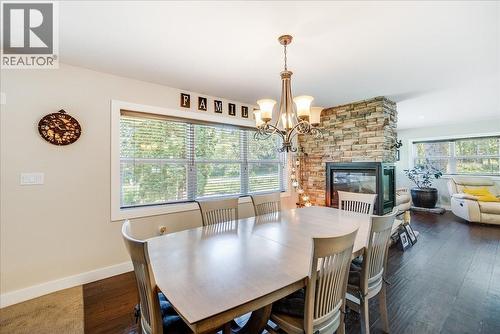 6010 Harrop-Procter Road, Nelson, BC - Indoor Photo Showing Dining Room With Fireplace