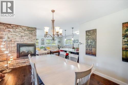 6010 Harrop-Procter Road, Nelson, BC - Indoor Photo Showing Dining Room With Fireplace