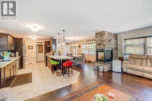 6010 Harrop-Procter Road, Nelson, BC - Indoor Photo Showing Living Room With Fireplace