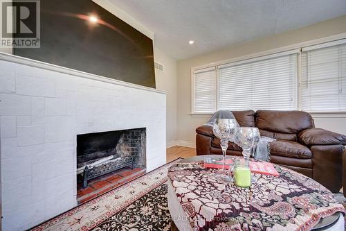 1235 Old River Road, Mississauga, ON - Indoor Photo Showing Living Room With Fireplace
