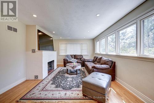 1235 Old River Road, Mississauga, ON - Indoor Photo Showing Living Room With Fireplace
