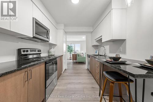 8 - 182 Bridge Crescent, Minto, ON - Indoor Photo Showing Kitchen With Upgraded Kitchen