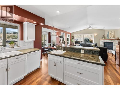 519 5Th Street, Vernon, BC - Indoor Photo Showing Kitchen With Fireplace