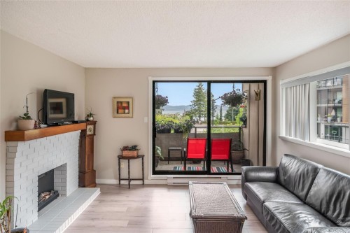 201-309 Morison Ave, Parksville, BC - Indoor Photo Showing Living Room With Fireplace