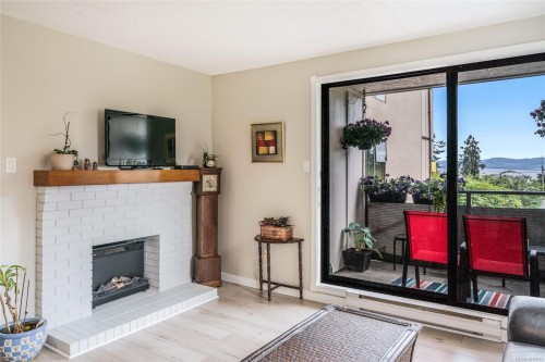 201-309 Morison Ave, Parksville, BC - Indoor Photo Showing Living Room With Fireplace