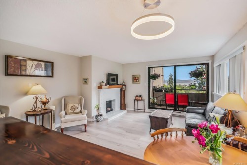 201-309 Morison Ave, Parksville, BC - Indoor Photo Showing Living Room With Fireplace