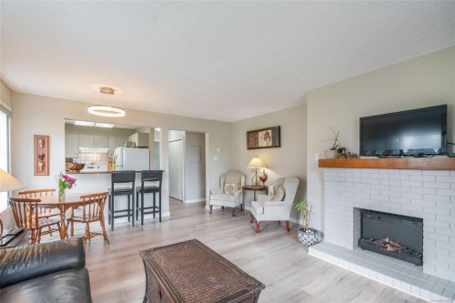 201-309 Morison Ave, Parksville, BC - Indoor Photo Showing Living Room With Fireplace