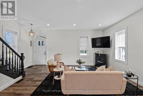 15 Queen Street E, Minto, ON - Indoor Photo Showing Living Room With Fireplace