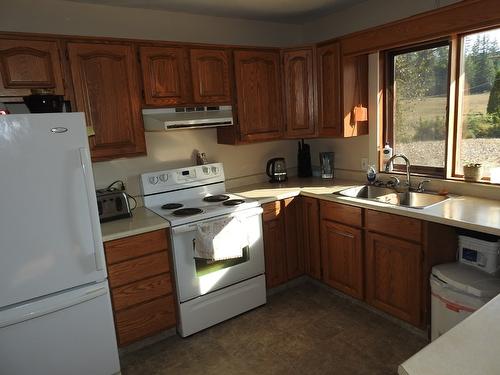 1852 Trinity Valley Road, Lumby, BC - Indoor Photo Showing Kitchen With Double Sink