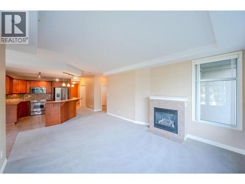 100 Lakeshore Drive W Unit# 115, Penticton, BC - Indoor Photo Showing Other Room With Fireplace