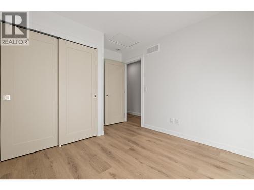 Upper Level First Bedroom - 2957 Conlin Court Unit# 2, Kelowna, BC - Indoor Photo Showing Other Room