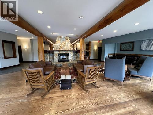5258 Highline Drive Unit# 122, Fernie, BC - Indoor Photo Showing Other Room With Fireplace